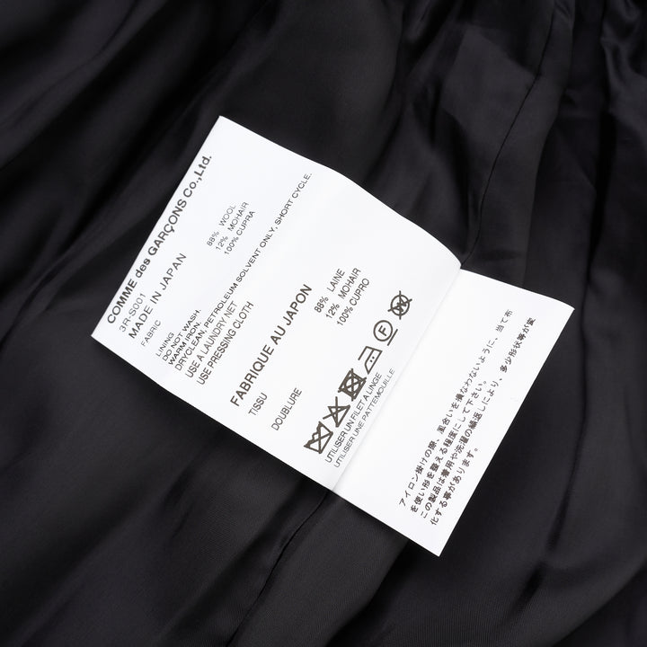 Noir Kei Ninomiya black wool doeskin midi skirt with an oversized sculptural bow, gathered elastic waist and bubble hem - view 4