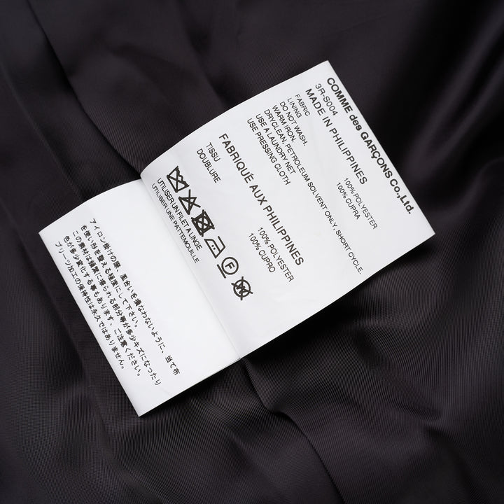 Black satin midi skirt with elasticated waist and three tiers of gathered ruffles at the hem by Noir Kei Ninomiya - view 4
