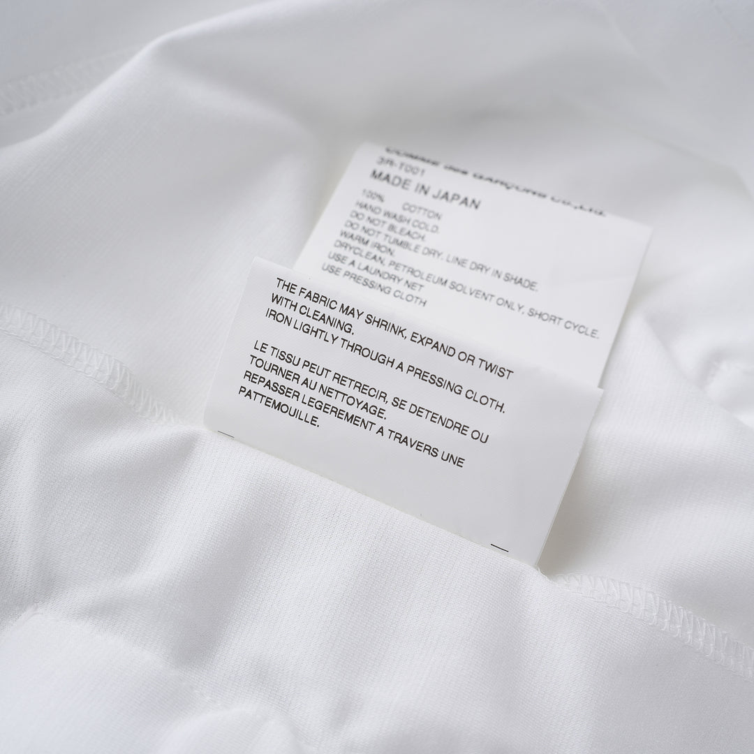 Noir Kei Ninomiya white long-sleeve cotton ponte top with oversized bow details at the hem - view 4