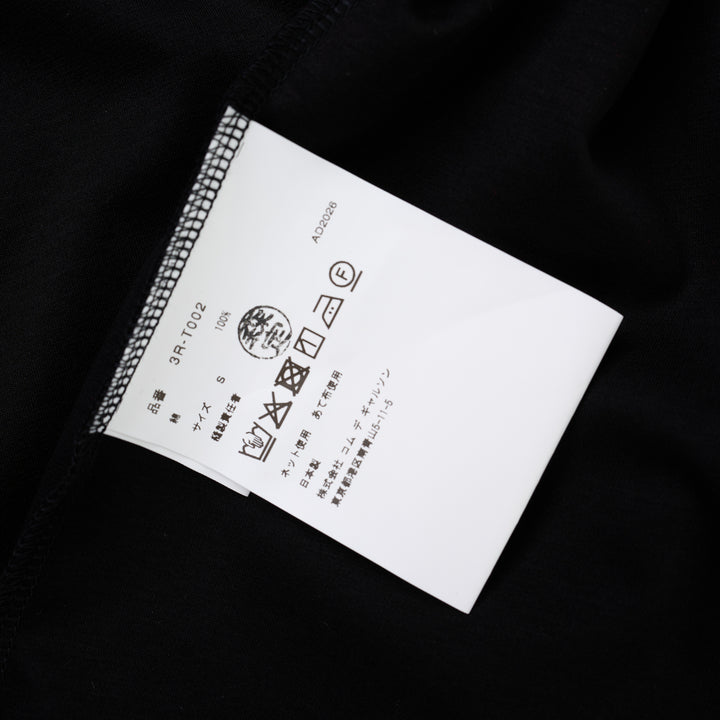 Noir Kei Ninomiya black cotton ponte tee with crew neck and twisted knot detailing on both short sleeves, shown from the front - view 4