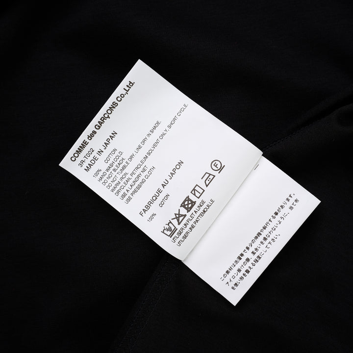 Noir Kei Ninomiya black cotton ponte tee with crew neck and twisted knot detailing on both short sleeves, shown from the front - view 5