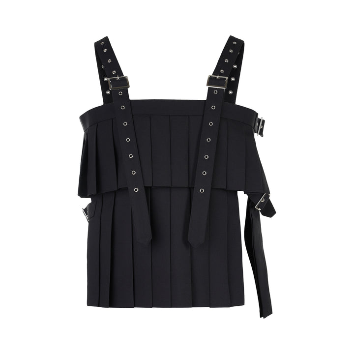 Noir Kei Ninomiya black pleated vest in wool polyester gabardine with grommet-studded buckle straps and layered peplum