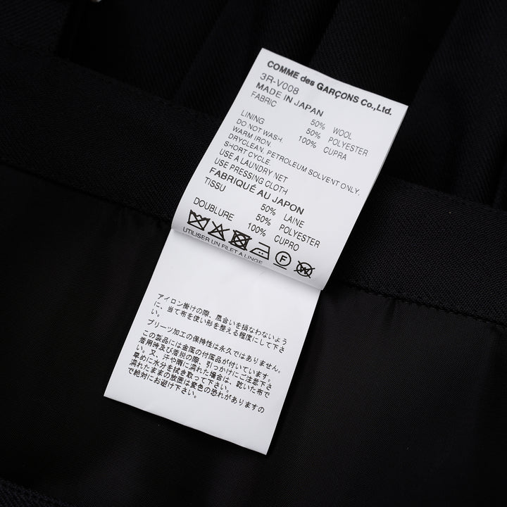 Noir Kei Ninomiya black pleated vest in wool polyester gabardine with grommet-studded buckle straps and layered peplum - view 5