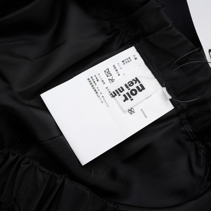 Noir Kei Ninomiya black wide-leg pants in cupra twill and wool gabardine with elasticated waist and layered tailored lower section - view 3