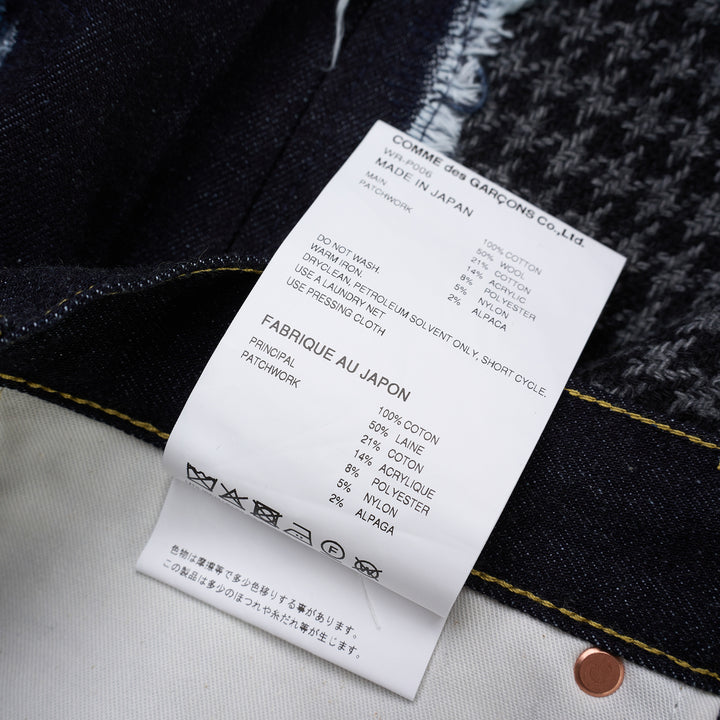 Junya Watanabe dark indigo straight-leg jeans with frayed herringbone, houndstooth and camouflage patchwork panels, front view - view 3