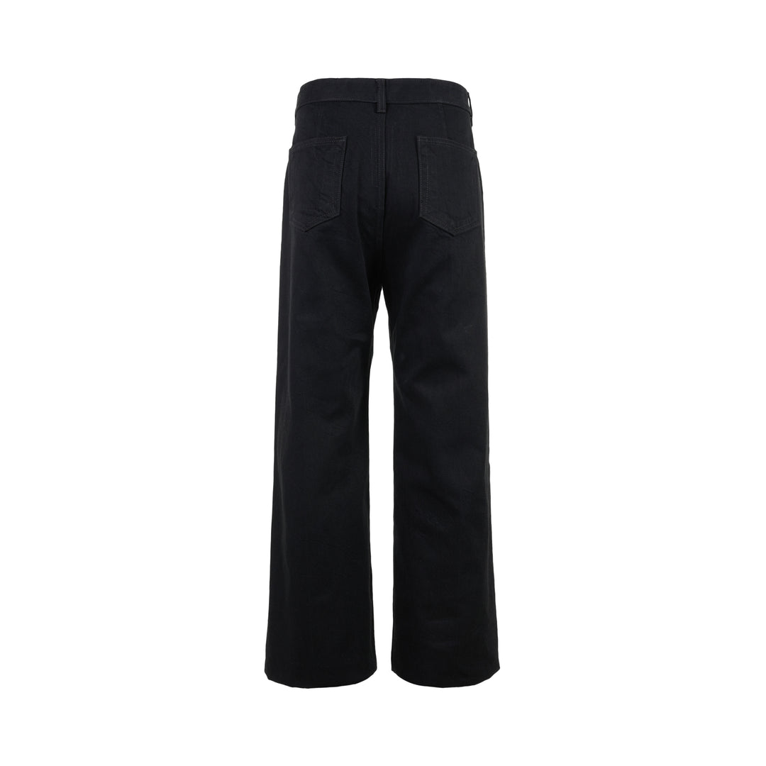 Rick Owens Geth Jeans in black denim with a wide-leg silhouette, shown from the front with button fly and five-pocket detailing - view 2