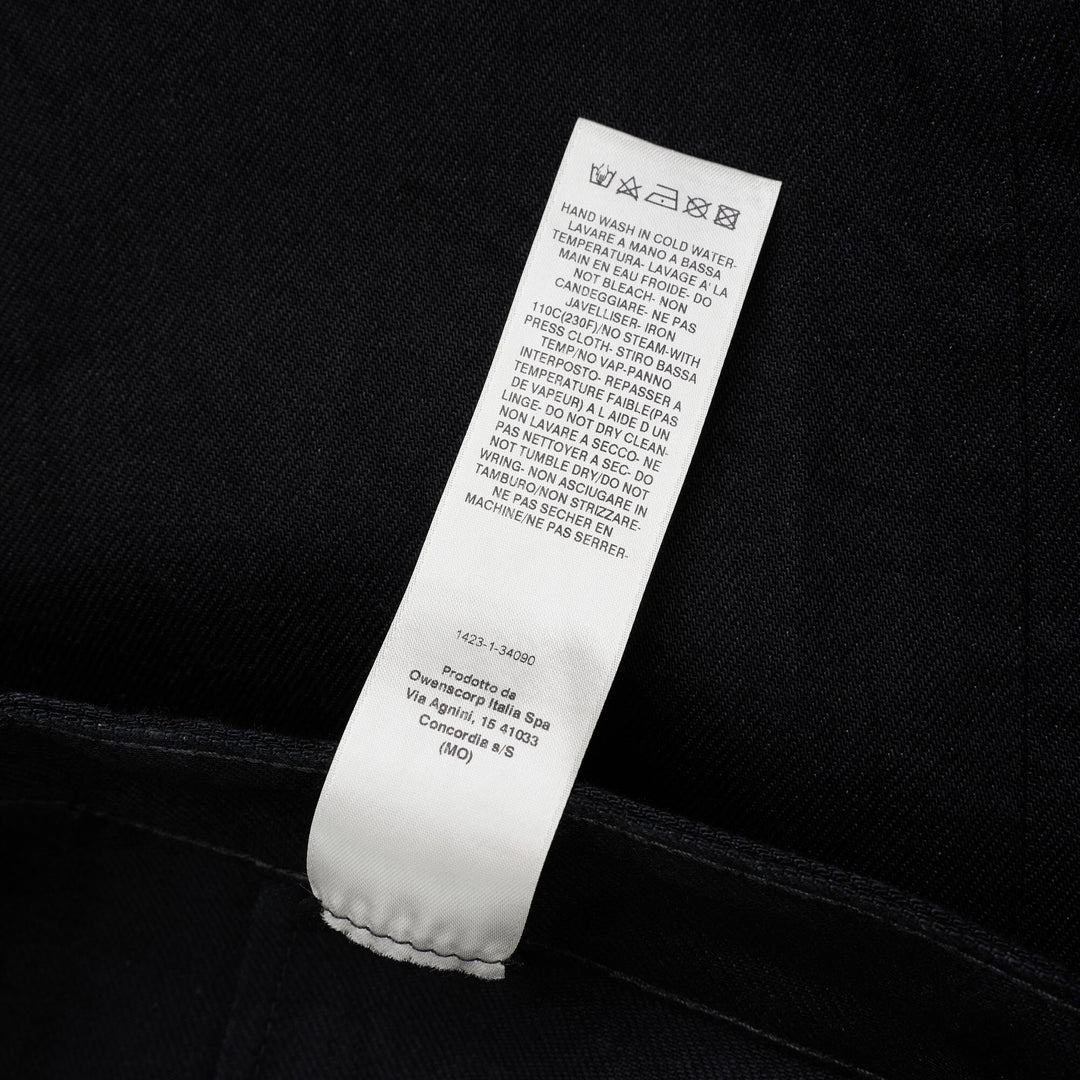 Rick Owens Geth Jeans in black denim with a wide-leg silhouette, shown from the front with button fly and five-pocket detailing - view 4