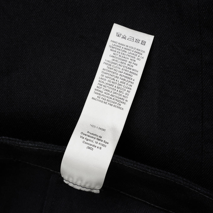 Rick Owens Geth Jeans in black denim with a wide-leg silhouette, shown from the front with button fly and five-pocket detailing - view 4