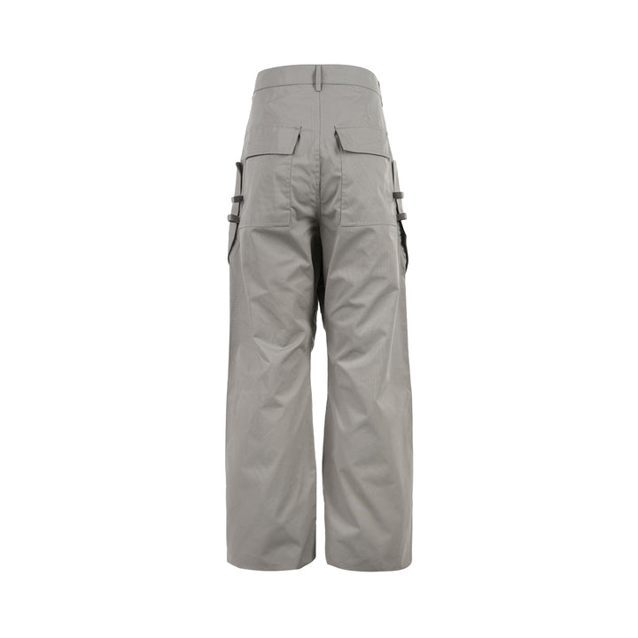 Rick Owens Stefan cargo pants in a grey cotton-nylon ripstop with oversized flap pockets and a wide-leg silhouette, shown from the front - view 2