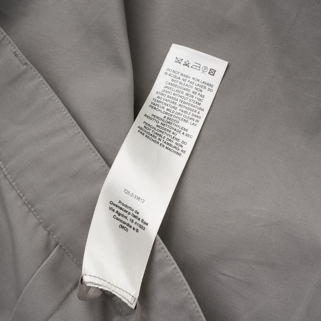 Rick Owens Stefan cargo pants in a grey cotton-nylon ripstop with oversized flap pockets and a wide-leg silhouette, shown from the front - view 4