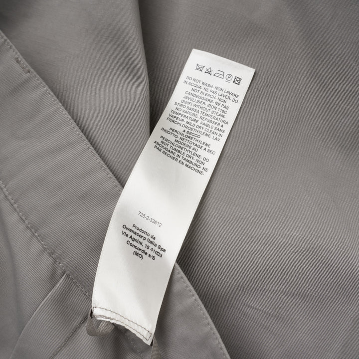 Rick Owens Stefan cargo pants in a grey cotton-nylon ripstop with oversized flap pockets and a wide-leg silhouette, shown from the front - view 4