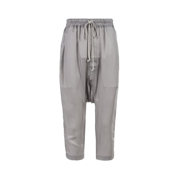 Rick Owens grey drawstring cropped pants with a dropped crotch, elasticated waistband and fluid, semi-sheer fabric, shown from the front