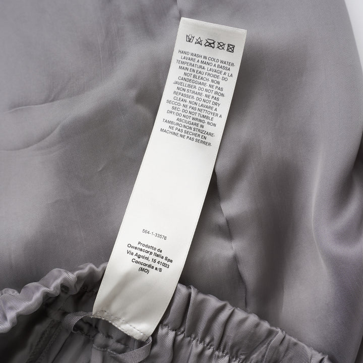 Rick Owens grey drawstring cropped pants with a dropped crotch, elasticated waistband and fluid, semi-sheer fabric, shown from the front - view 4