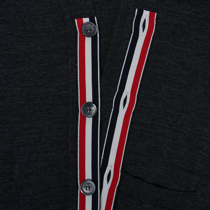 Thom Browne Classic V-Neck Cardigan in light blue with signature 4-Bar white stripe on sleeve and white button front placket
