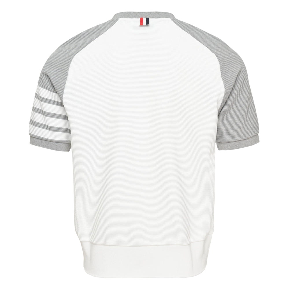 Thom Browne Short Sleeve Saddle Sweatshirt in white with grey raglan sleeves and 4-bar stripe detail on sleeve