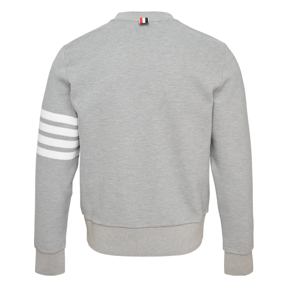 Thom Browne 4-Bar Cotton Pullover Sweatshirt in heather grey with white four-stripe detail on the sleeve and ribbed crewneck collar