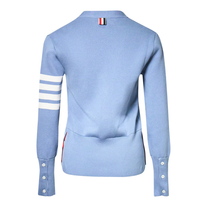 Thom Browne sky blue Milano stitch cardigan with four white bar stripes on the sleeve, V-neck, button front, and patch pockets