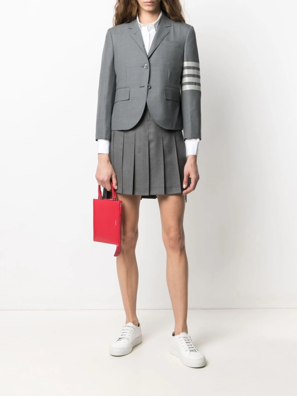 Thom Browne grey plain weave sport coat with 4-bar white stripe on sleeve and striped lining, front view