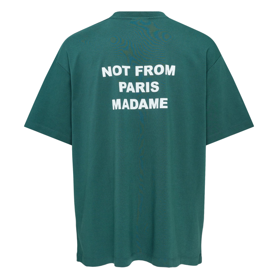 Drôle de Monsieur Not From Paris Madame slogan tee in forest green with white chest print, oversized fit, crew neck