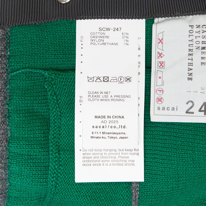 sacai Cashmere Knit Cardigan in heather grey with green contrast lining, V-neckline, four-button front closure, and dual front pockets