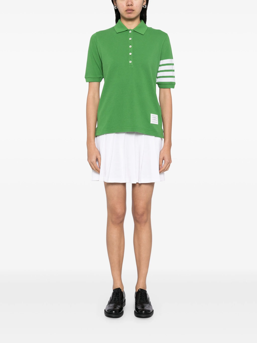 Thom Browne light blue short sleeve piqué polo shirt with white 4-bar stripe on sleeve and tri-colour hem trim, made in Italy