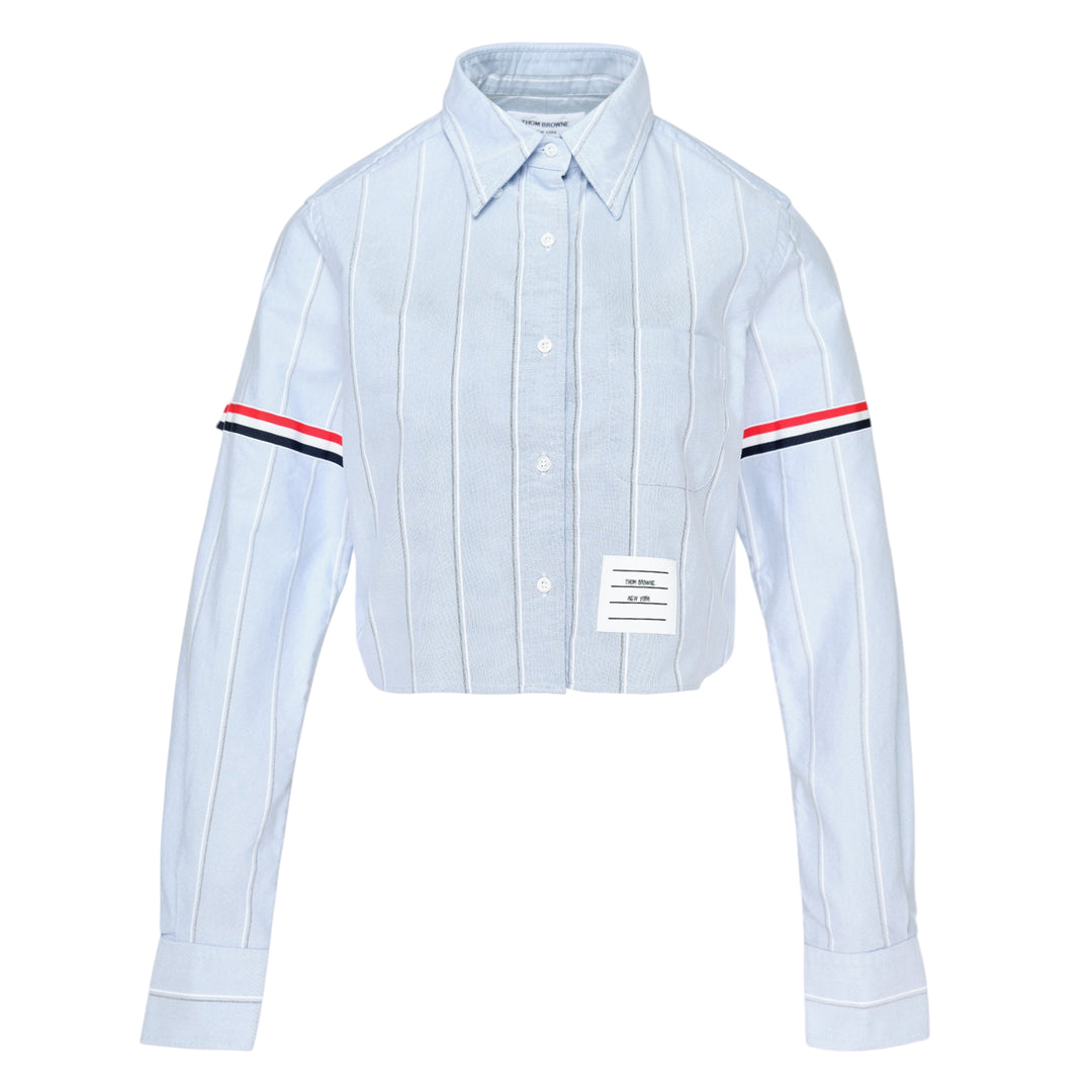 Thom Browne white pinstripe oxford cropped shirt with red, white and black grosgrain armband stripe on the sleeve and button-down collar