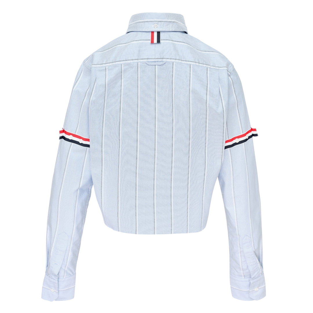 Thom Browne white pinstripe oxford cropped shirt with red, white and black grosgrain armband stripe on the sleeve and button-down collar
