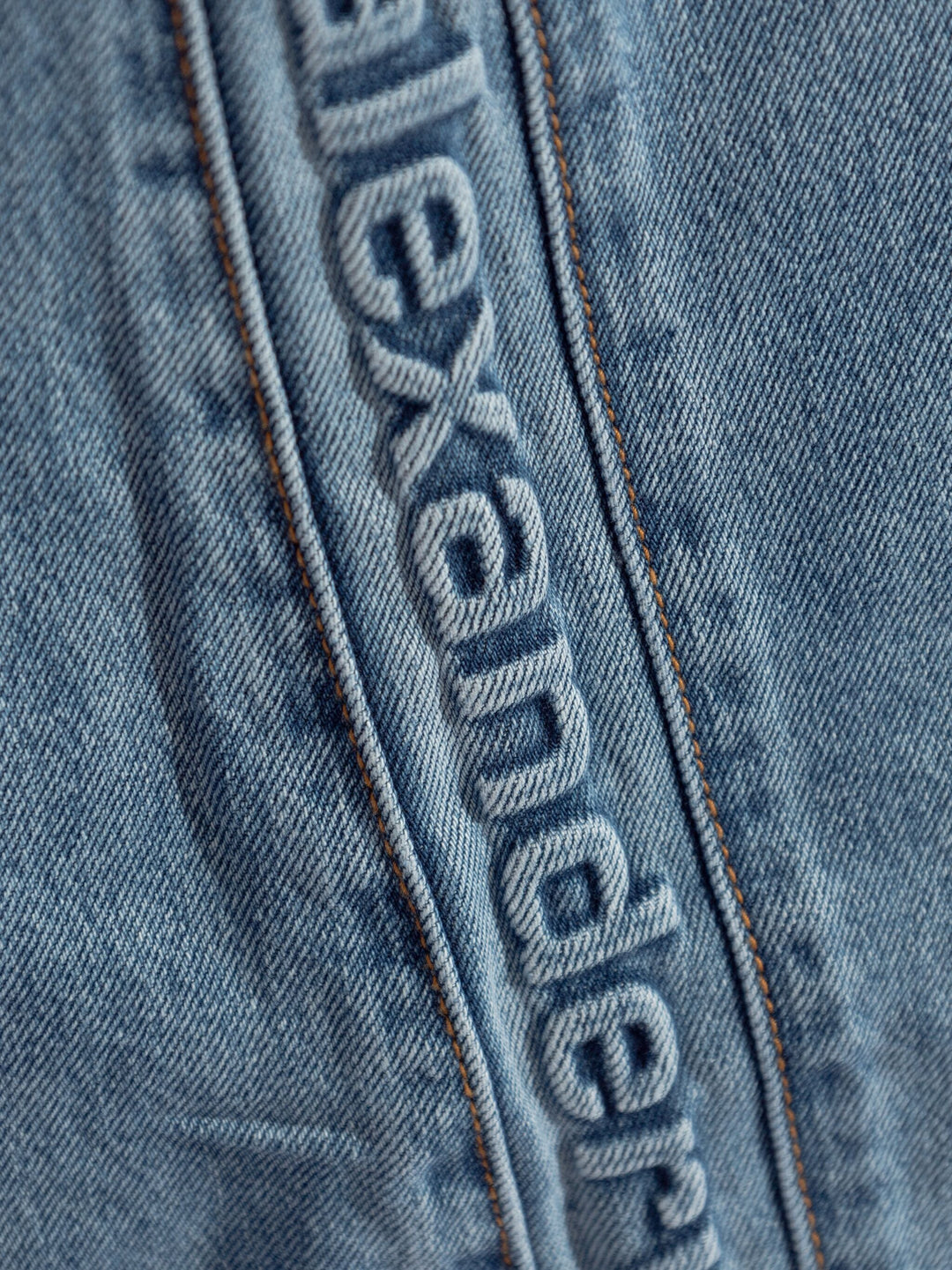 Logo-Embossed Balloon Jeans
