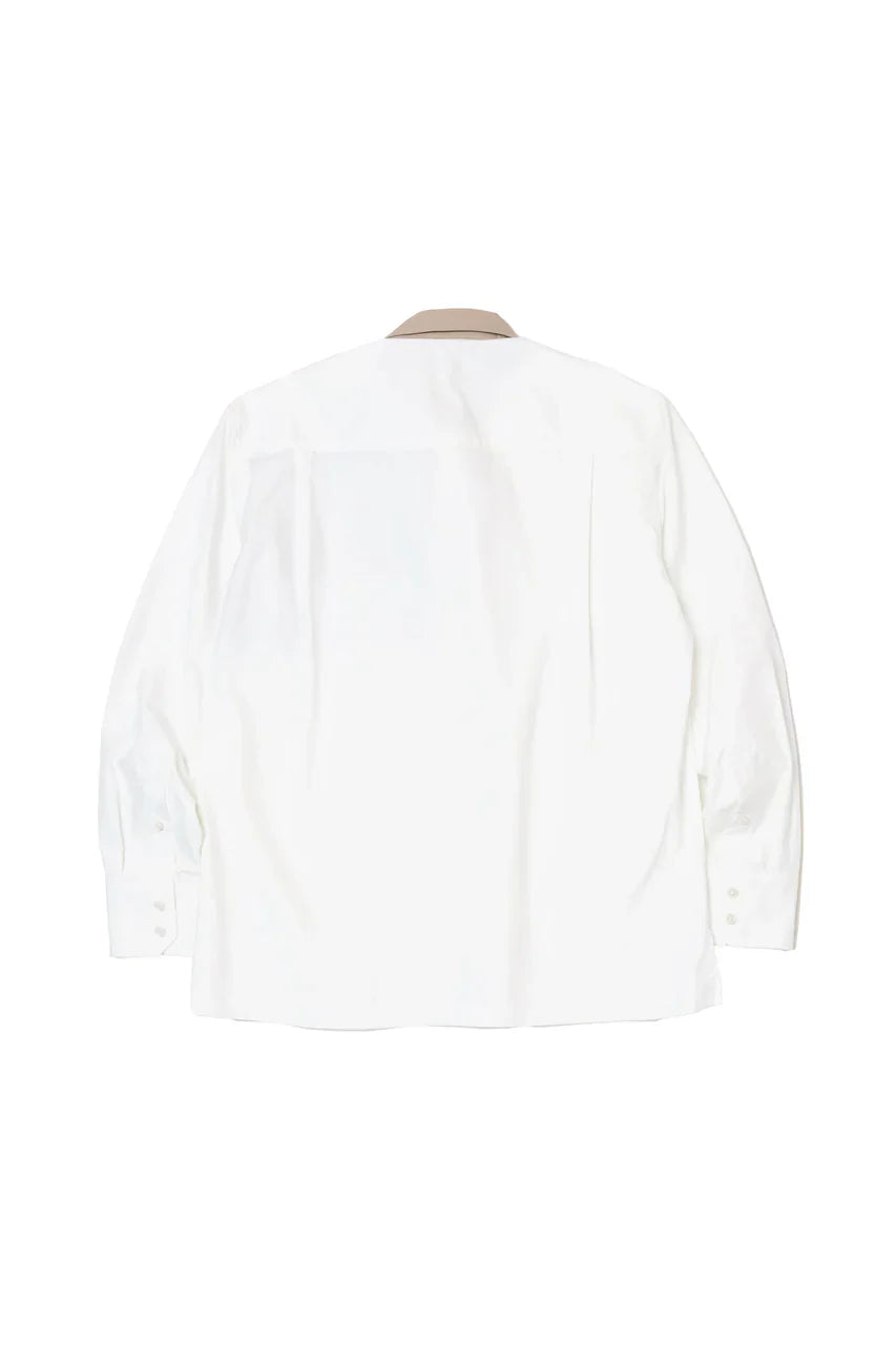 قميص بواجهة غير متساوية