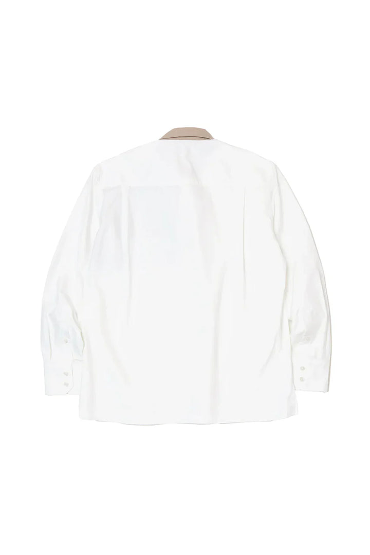 قميص بواجهة غير متساوية