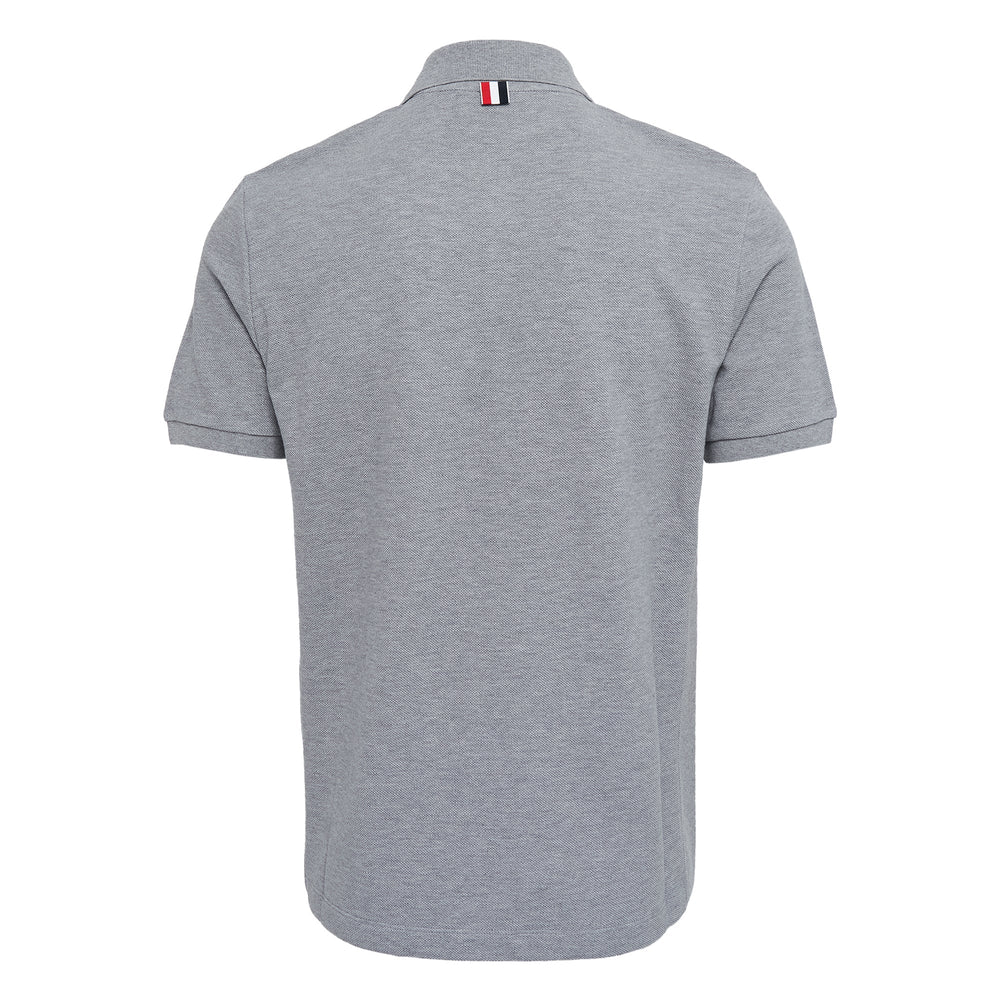 Thom Browne Short Sleeve Rib Cuff Polo in heather grey piqué with 4-bar white stripe on sleeve and button placket, front view
