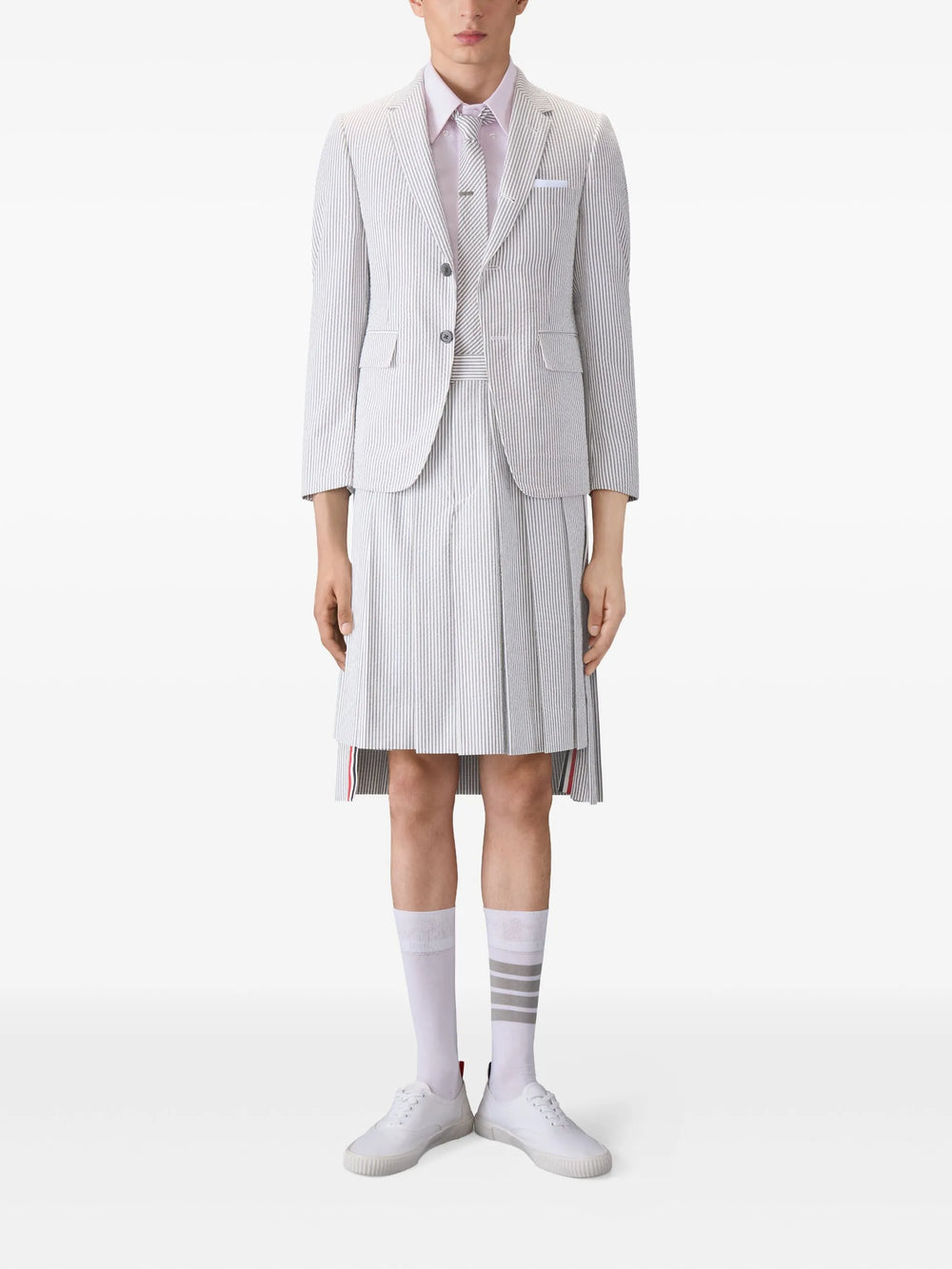 Thom Browne Oxford Short Sleeve Shirt in light grey with point collar, button-down tabs, chest patch pocket, and signature brand label at hem