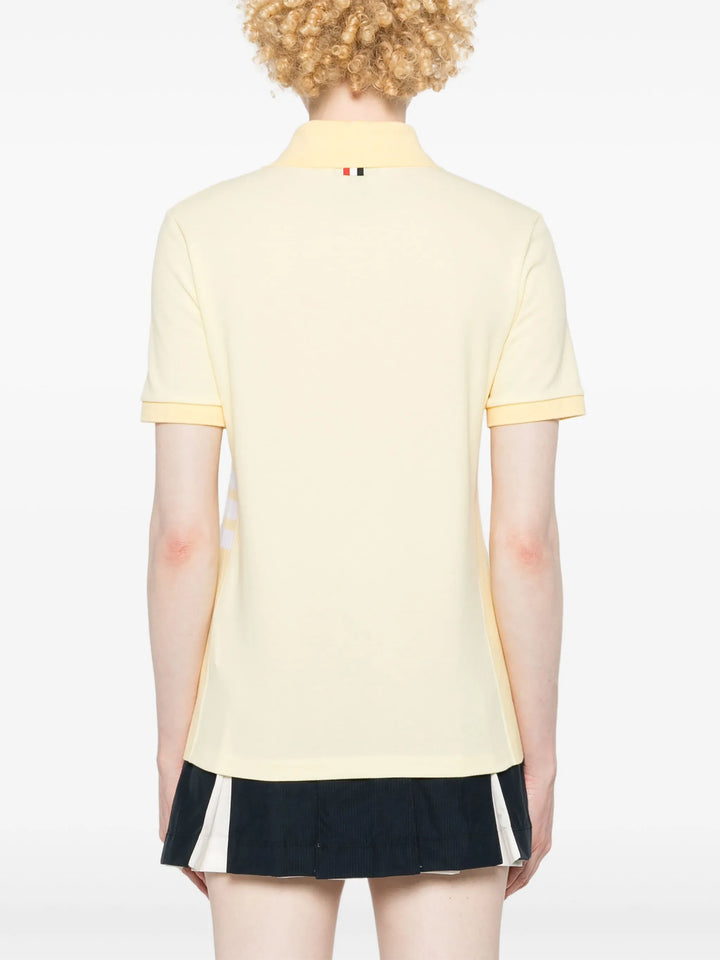 بولو بأكمام قصيرة وحواف مضلعة