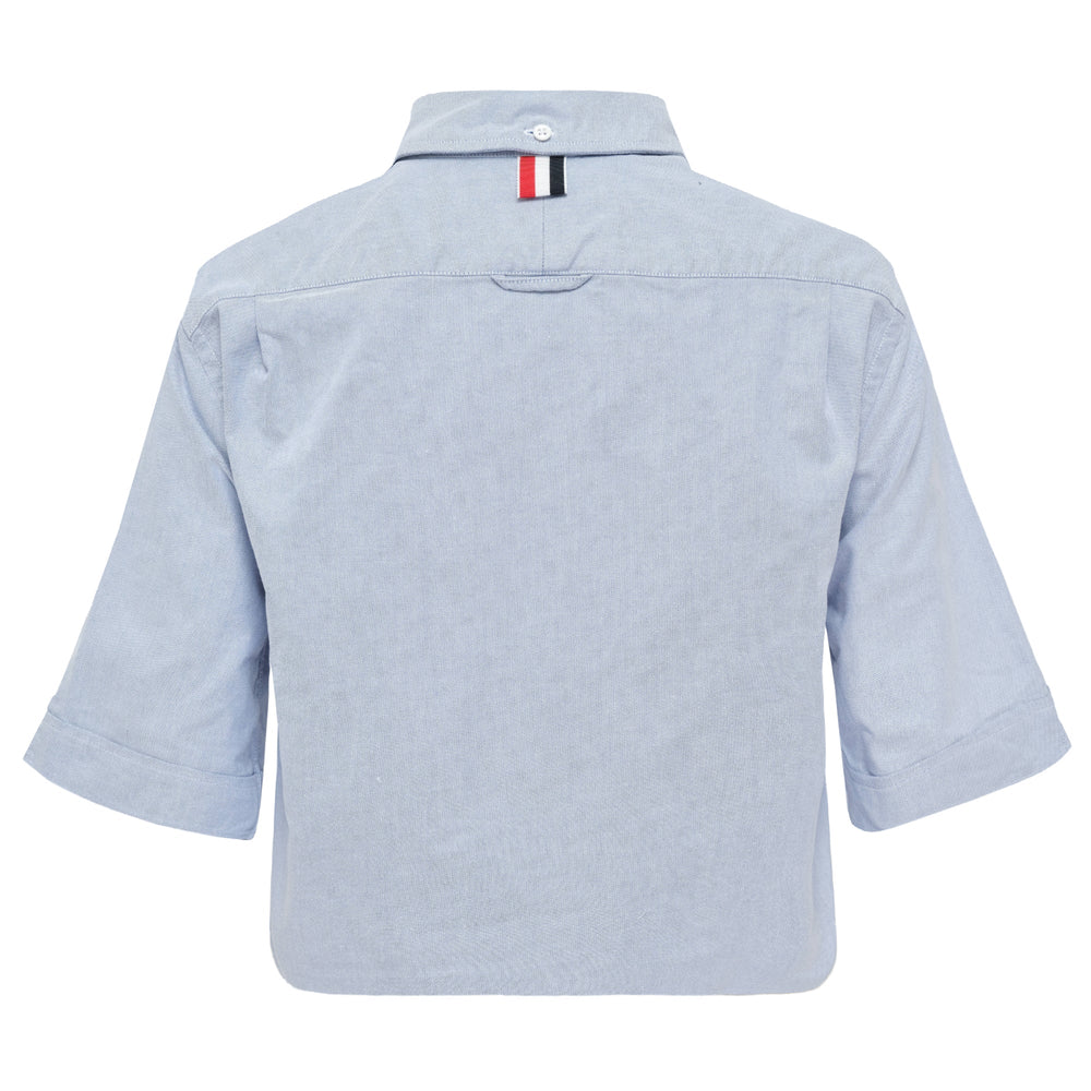 Thom Browne light blue Oxford cotton cropped button-down point collar shirt with short rolled sleeves and signature logo label