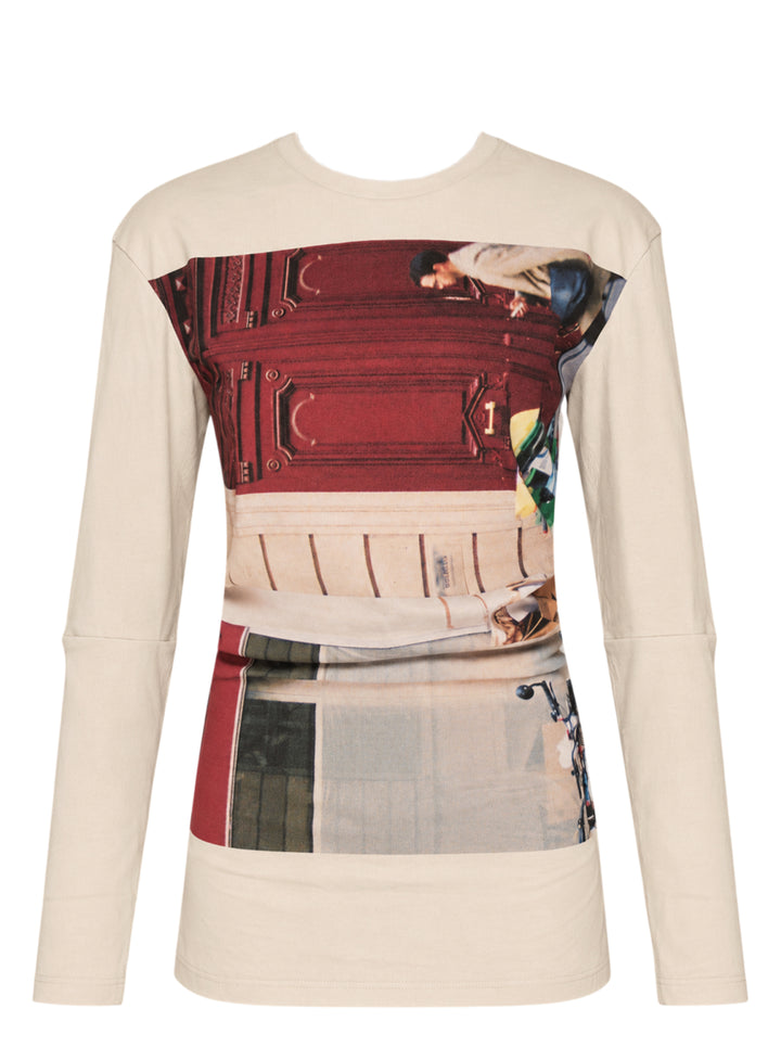 Issey Miyake Street View long sleeve top in beige with a photographic print of a burgundy door, passerby and bicycle across the body