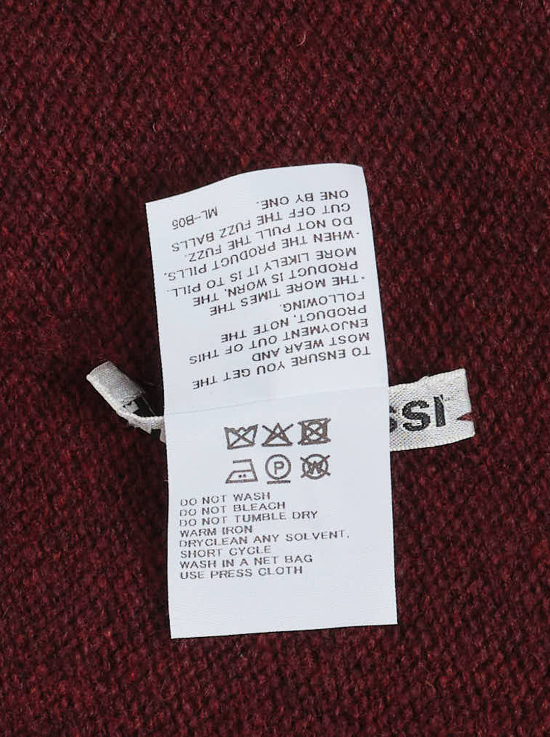 Issey Miyake burgundy oversized crewneck knit sweater with two knitted straps hanging from the hem - view 3
