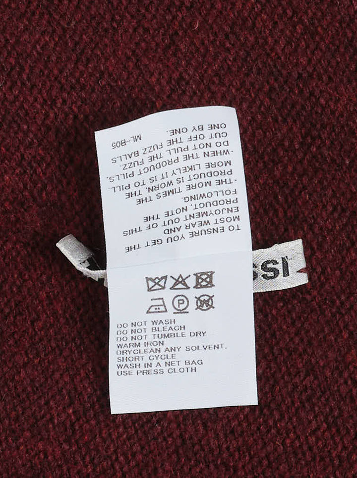 Issey Miyake burgundy oversized crewneck knit sweater with two knitted straps hanging from the hem - view 3