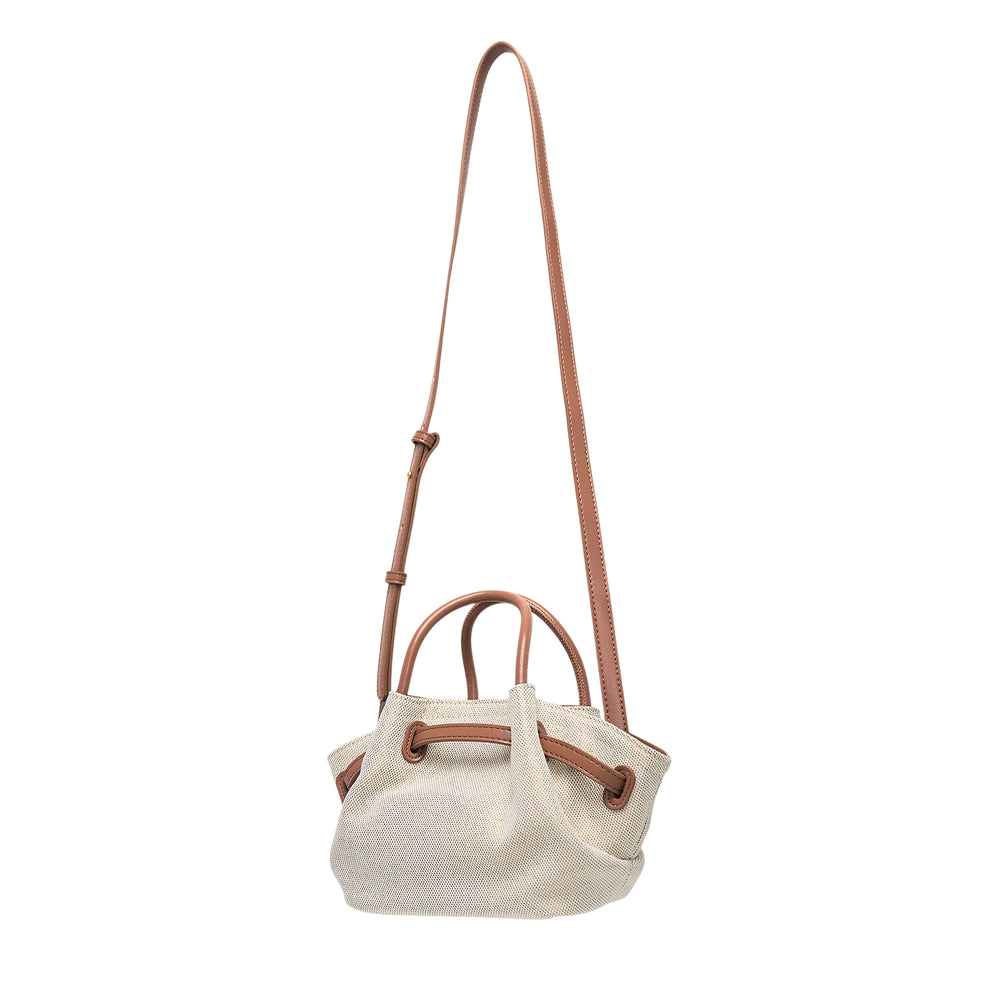 JW PEI Hana Mini Tote Bag in cream textured canvas with tan leather trim, rolled top handles, winged side panels, and gold-tone hardware closure