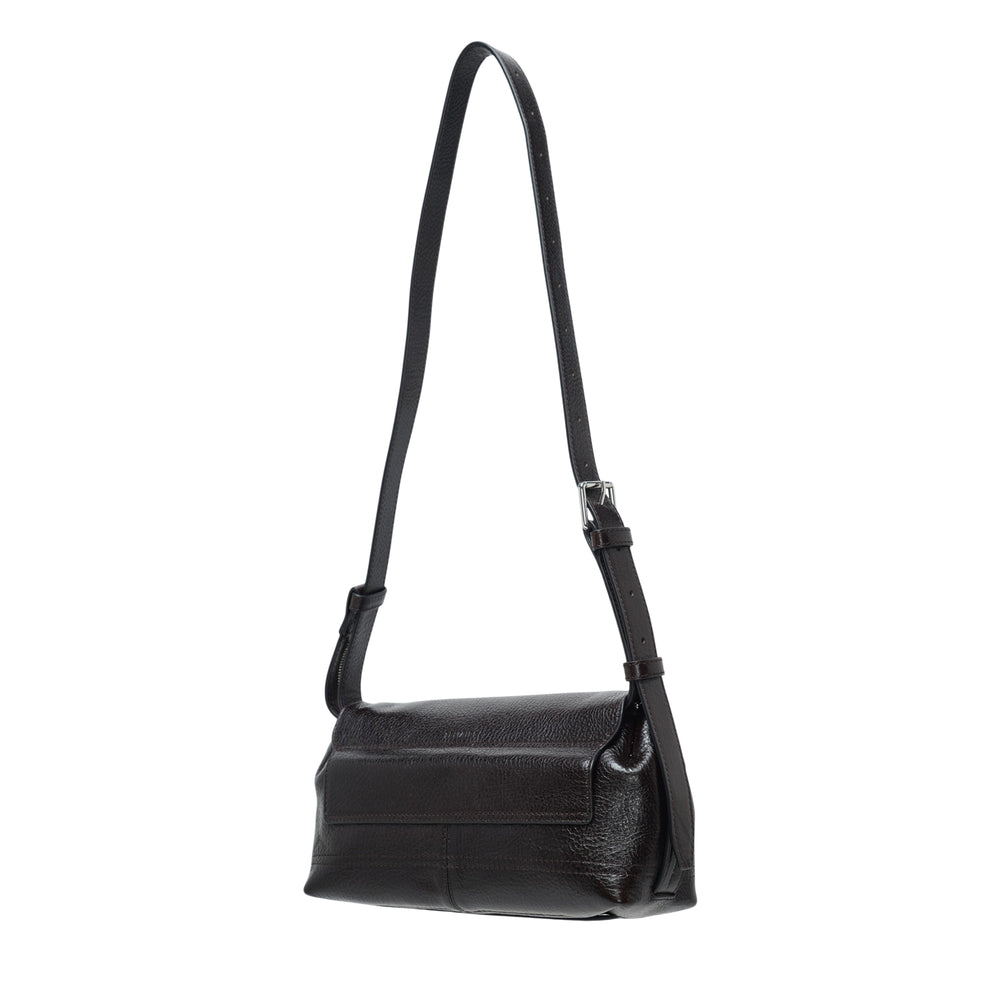 Lemaire Small Gear Bag in black pebbled leather with silver push-lock closure and adjustable crossbody strap, front view on white background