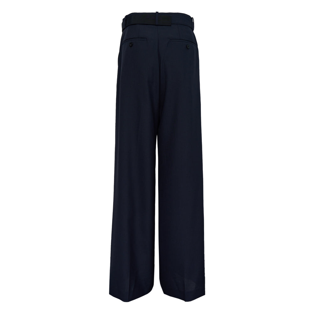 sacai Wide Leg Belted Suiting Pants in navy with matching belt and metal buckle, high-waisted tailored trousers