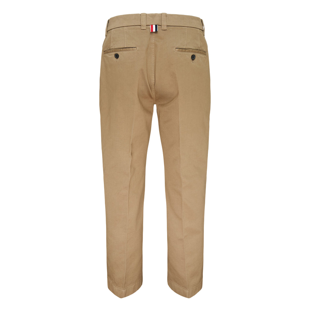 Thom Browne Utility Chino Trousers in khaki beige with cuffed hem and belt loops, flat lay on white background