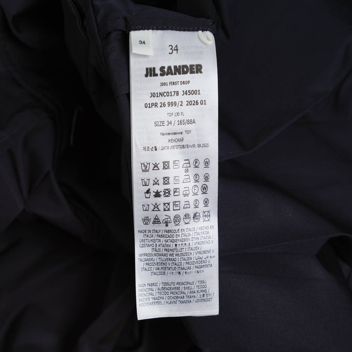 Jil Sander navy organic cotton poplin sleeveless mini dress with V-neckline and pleated dropped-waist skirt