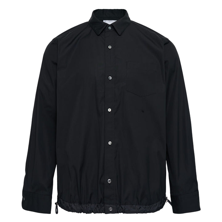 sacai Cotton Poplin Shirt in black with contrast nylon elasticated drawstring hem, silver-tone buttons, and chest patch pocket