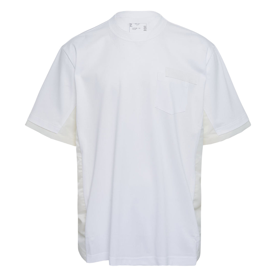 sacai Nylon Twill x Cotton Jersey T-Shirt in white with chest pocket and contrast nylon twill side panels, oversized relaxed fit