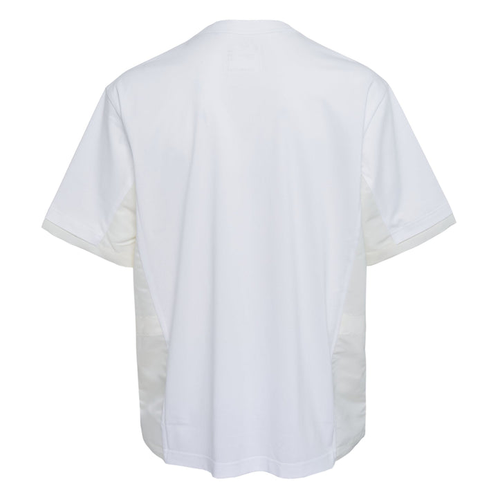 sacai Nylon Twill x Cotton Jersey T-Shirt in white with chest pocket and contrast nylon twill side panels, oversized relaxed fit