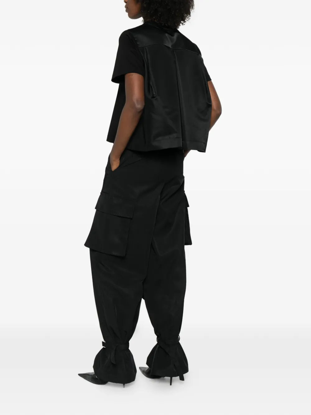 sacai Nylon Twill x Cotton Jersey T-Shirt in black, flat lay front view showing crew neckline and nylon shoulder panels