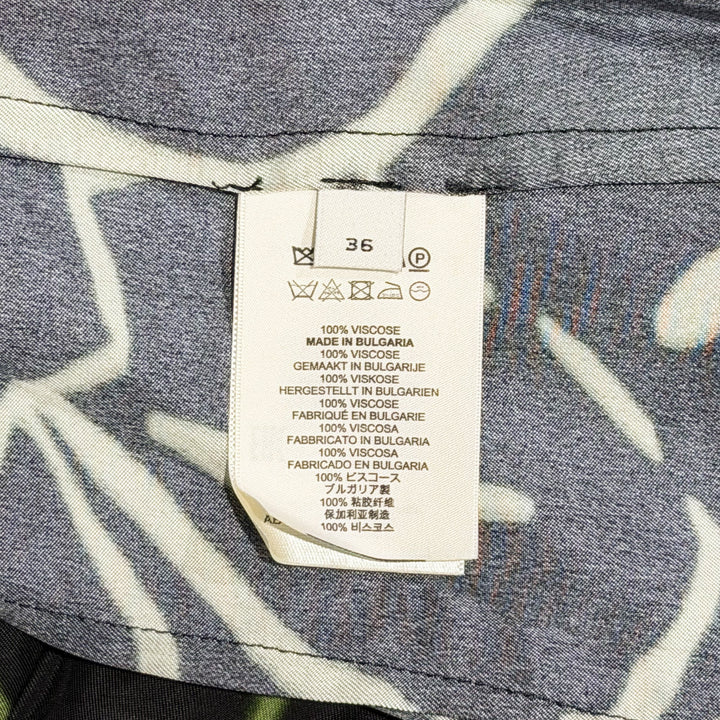 Sleeveless Wrap Blouse With Ruffle