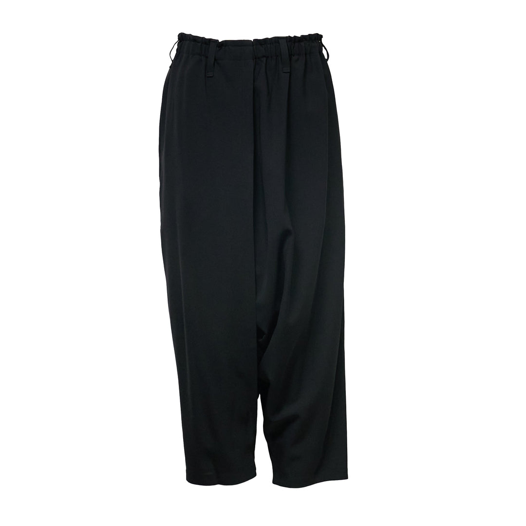 132 5. Issey Miyake black seamless woven drop crotch pants with elasticated drawstring waistband and cropped wide-leg silhouette