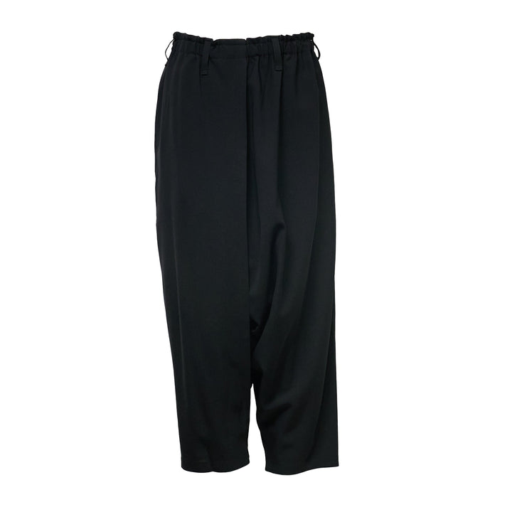 132 5. Issey Miyake black seamless woven drop crotch pants with elasticated drawstring waistband and cropped wide-leg silhouette