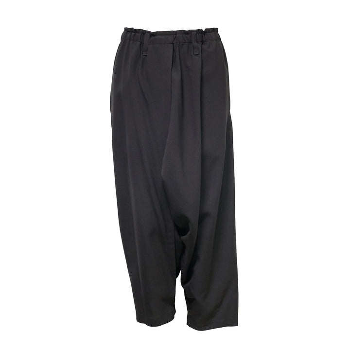 132 5. Issey Miyake black seamless woven drop crotch pants with elasticated drawstring waistband and cropped wide-leg silhouette